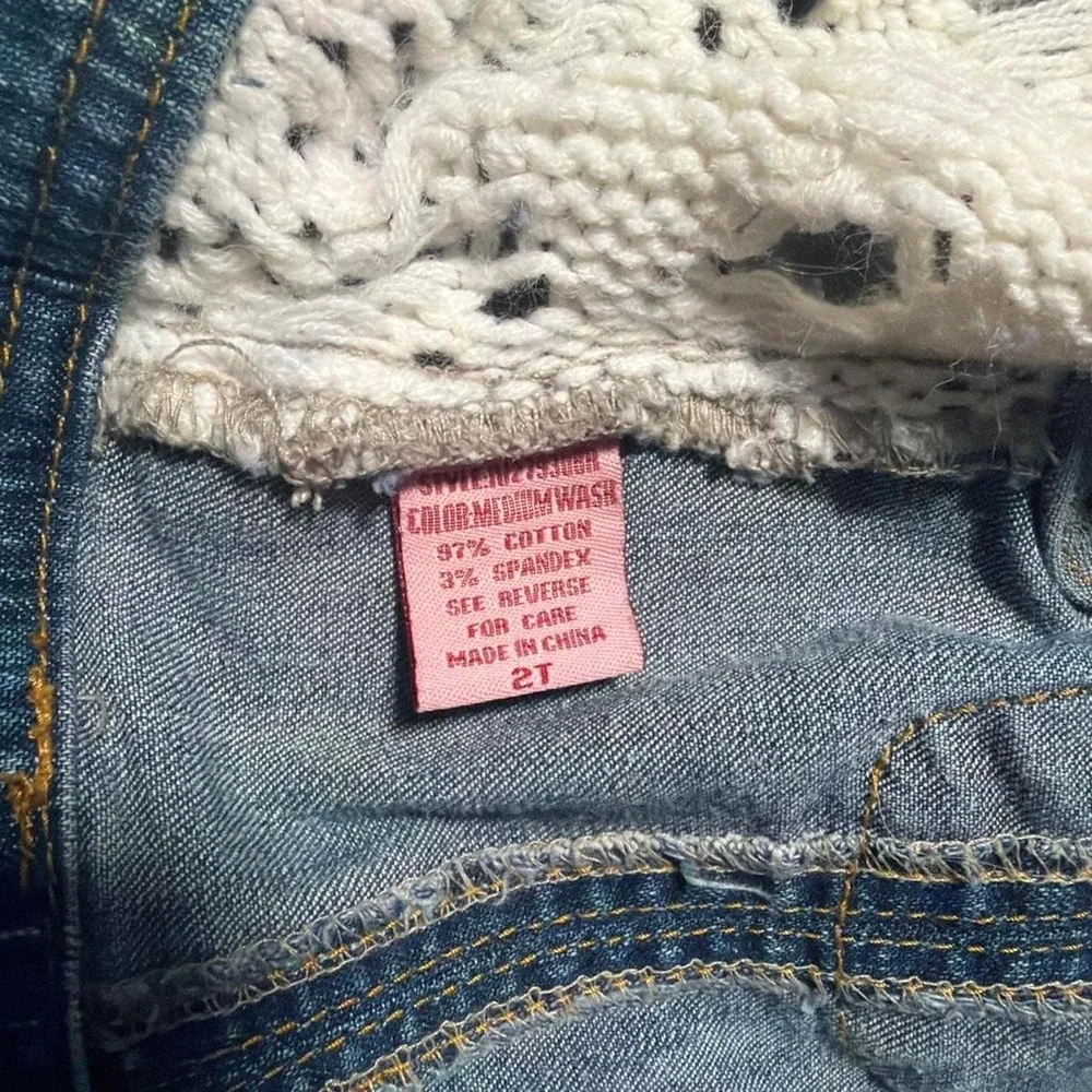 blue denim vest with frayed hem
